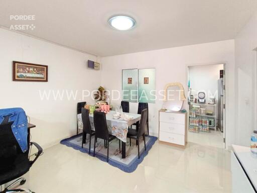 Modern dining room with table set for four