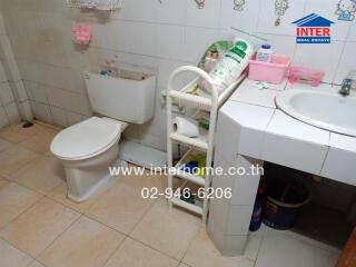 Bathroom with toilet and sink