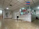 Interior of a building with tiled floors and reception area