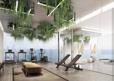 Modern gym with city views and greenery