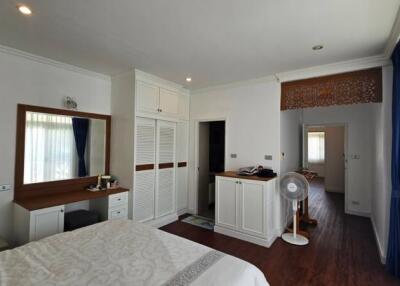 Spacious bedroom with attached dressing area and closet