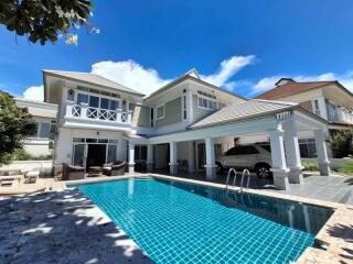 Exterior view of a house with a pool