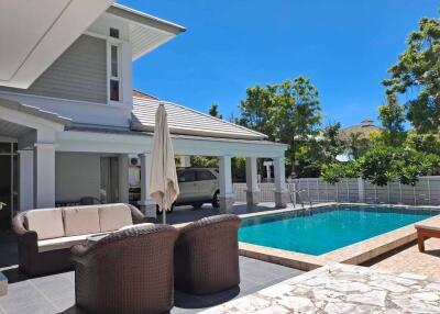 Outdoor patio area with pool