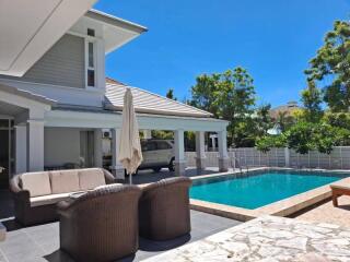 Outdoor patio area with pool