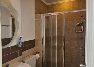 Modern bathroom with shower and amenities