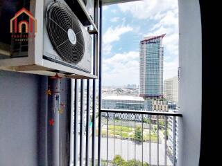 Balcony with air conditioning unit and city view