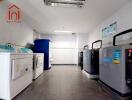 Clean and spacious laundry room with modern machines