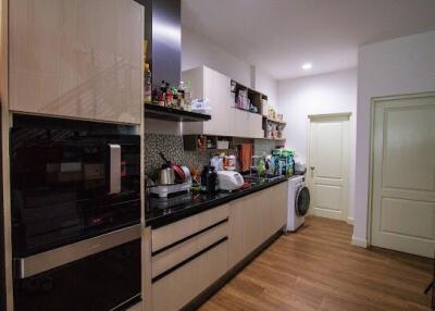 Modern kitchen with ample storage and built-in appliances