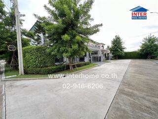 Exterior view of a residential building with a driveway