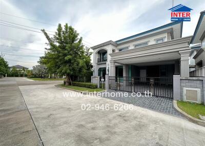 Front view of a residential building with driveway