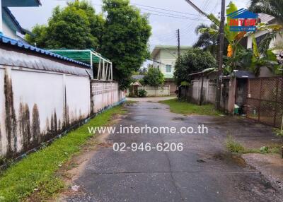 Residential street view with houses and greenery