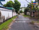 Residential street view with houses and greenery