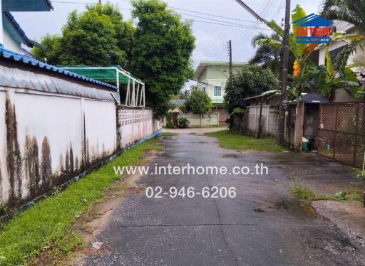 Residential street view with houses and greenery