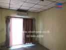 Bedroom with an air conditioner and curtain-covered window