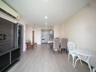 Spacious living room with open dining area