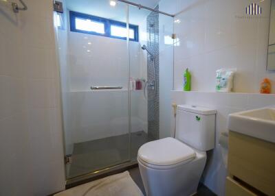 Modern bathroom with glass shower enclosure