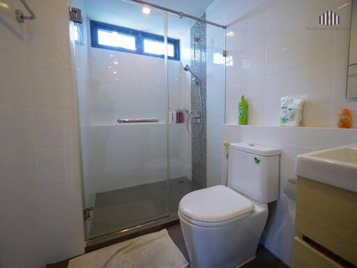 Modern bathroom with glass shower enclosure