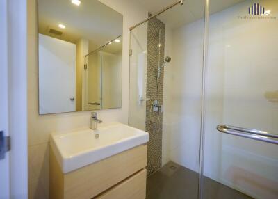 Modern bathroom with shower and vanity