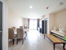 Spacious, well-lit living room with dining area