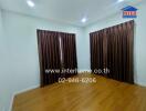 Bedroom with wooden flooring and brown curtains