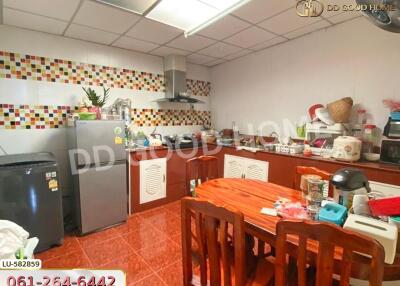 Modern kitchen with dining table