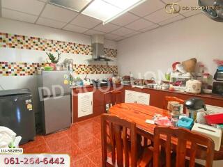 Modern kitchen with dining table