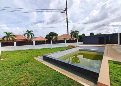 Outdoor pool in backyard