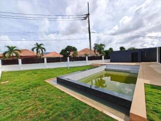 Outdoor pool in backyard