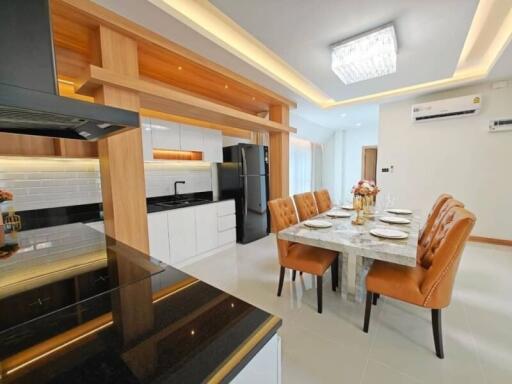 Modern kitchen and dining area with stylish furniture