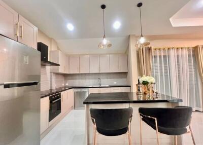 Modern kitchen with island and seating