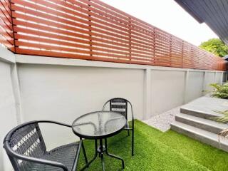 Outdoor patio with table and chairs