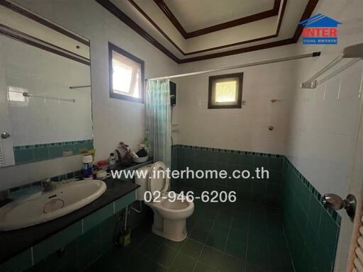 Spacious bathroom with modern fixtures