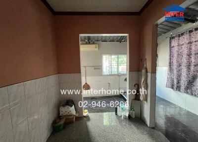 Semi-furnished kitchen with window and appliances