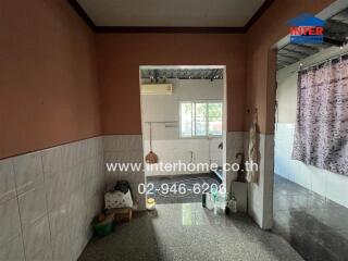 Semi-furnished kitchen with window and appliances