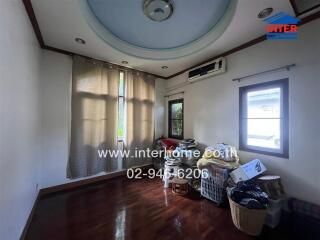 Bedroom with wooden floor and ceiling fan