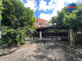 Front view of a house with a gate