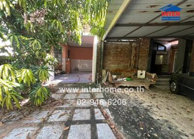 Outdoor area with garage and garden