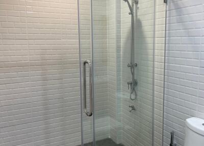 Modern bathroom with glass shower door