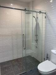 Modern bathroom with glass shower door