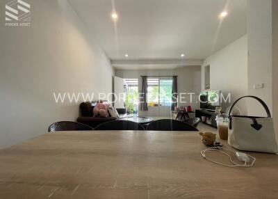 spacious living room with dining area and modern furnishings