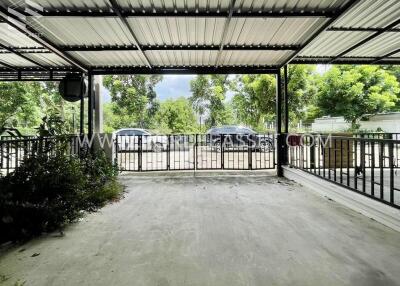 Covered garage space with gate