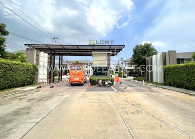 Entrance gate of a residential community named The Loft