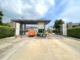 Entrance gate of a residential community named The Loft