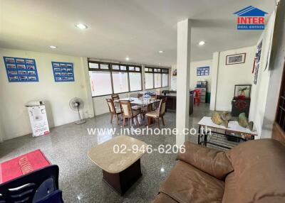 Spacious living area with dining table