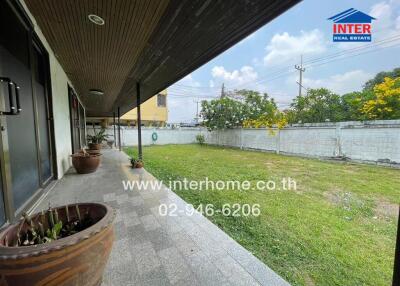 Outdoor covered patio with garden view