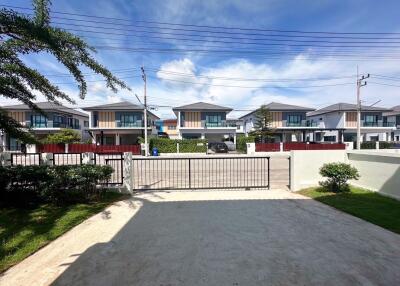 View of residential houses from a front yard