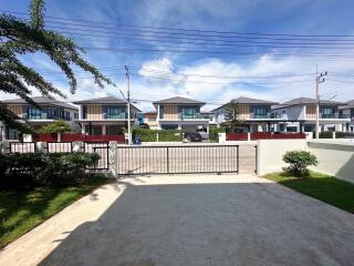 View of residential houses from a front yard