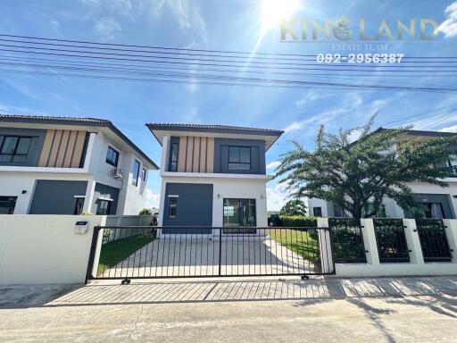 Modern two-story house with front yard