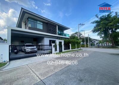 Modern two-story house with carport