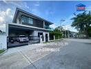 Modern two-story house with carport